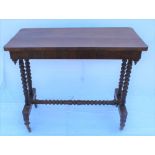 A 19TH CENTURY ROSEWOOD RECTANGULAR TOPPED CENTRE TABLE supported on four bobbin turned legs, united