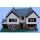 A 1960s LARGE SIZED DOLL'S HOUSE, having double opening double gable frontage (vacant possession