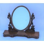 A 19TH CENTURY MAHOGANY FRAMED LARGE SIZED ADJUSTABLE OVAL PLAIN PLATE DRESSING TABLETOP MIRROR,