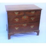 A 19TH CENTURY OAK CHEST OF TWO SHORT OVER TWO LONG DRAWERS, brass handles on bracket feet, 78cm
