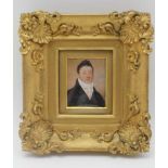AN EARLY 19TH CENTURY MINIATURE PORTRAIT WATERCOLOUR PAINTING, a Gentleman in a black jacket with