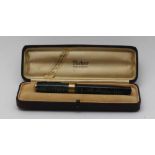 A PARKER VACUMATIC FOUNTAIN PEN with Duofold 14k nib, iridescent green barrel & cap, in original box