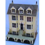 A LATE 20TH CENTURY GEORGIAN DESIGN IMPRESSIVE SIZED DOLL'S HOUSE having three gable roof, double