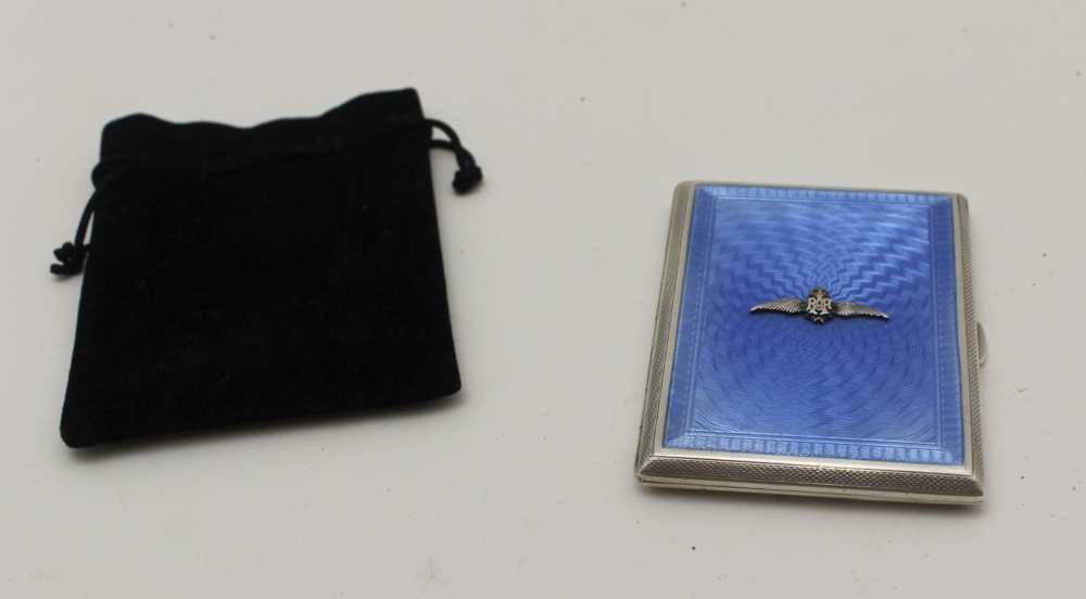 JOHN WILLIM BARRETT, AN RAF INSIGNIA SILVER & BLUE GUILLOCHE ENAMEL CIGARETTE CASE, gilded interior,