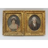A PAIR OF EARLY 19TH CENTURY OVAL MINIATURE PORTRAITS, in the style of T. Lawrence stipple