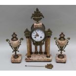 A LATE 19TH CENTURY FRENCH CLOCK GARNITURE, the clock brass & red veined marble, with