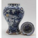 AN 18TH CENTURY DELFT JAR of baluster form, cobalt painted Chinoiserie landscape, 20cm high,