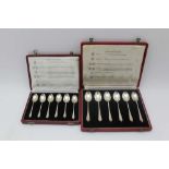 A CASE OF SILVER TEASPOONS & a case of silver coffee spoons, each with a different assay mark in