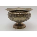 ARTHUR HARRIS, A SILVER BOWL WITH FLARED RIM, embossed floral and fluted body on circular platform