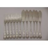 H. PIDDIUCK & SONS, A SET OF SILVER FISH KNIVES & FORKS FOR SIX SETTINGS, decorative handles