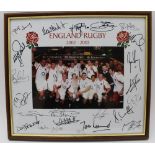 A PHOTOGRAPHIC PRINT OF THE ENGLAND RUGBY 2002-3 TEAM, surrounded by facsimile autographs,