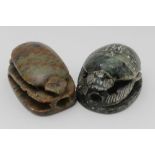 TWO 20TH CENTURY EGYPTIAN SOAPSTONE CARVINGS OF SCARAB BEETLES, inscised decoration, one is 10.5cm