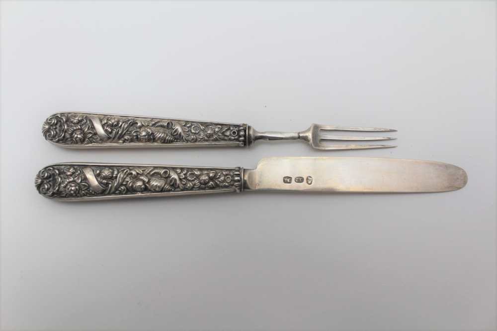 JOHN THROPP A George IV silver child's knife & three tyne fork, floral & shell embossed handles, c. - Image 2 of 3