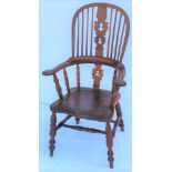 A 19TH CENTURY HORSESHOE & SPINDLE BACKED BROAD ARM WINSOR CHAIR, having pierced shaped central