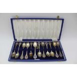 A COLLECTION OF TWELVE SILVER PLATED JERSEY COMMEMORATIVE TEASPOONS, the terminal enamelled with
