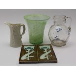 A ROYAL WORCESTER PORCELAIN LEAF FORM JUG, 12cm high, two Art Nouveau tiles, a flared rim vase,