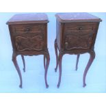 A PAIR OF LATE 19TH / EARLY 20TH CENTURY FRENCH BEDSIDE POT CUPBOARDS, having polished rouge