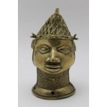 A LATE 19TH CENTURY WEST AFRICAN BRASS ALLOY CASTING OF A HEAD, most probably a King in the Benin