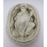 A LATE 19TH CENTURY PARIAN FIGURE, modelled as Sir John Falstaff hiding in a basket of linen,