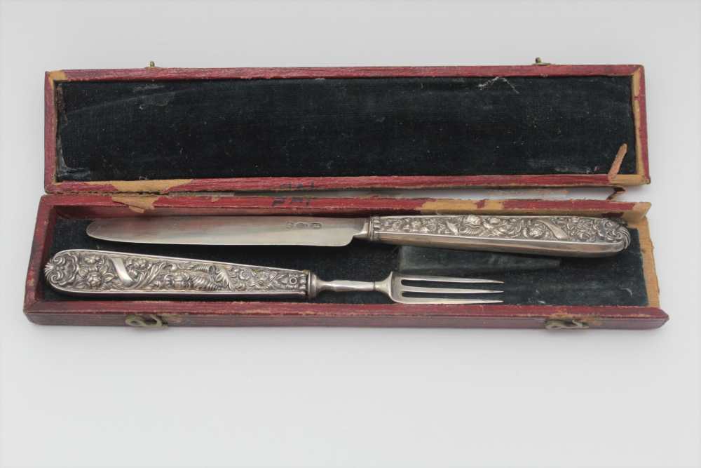 JOHN THROPP A George IV silver child's knife & three tyne fork, floral & shell embossed handles, c.