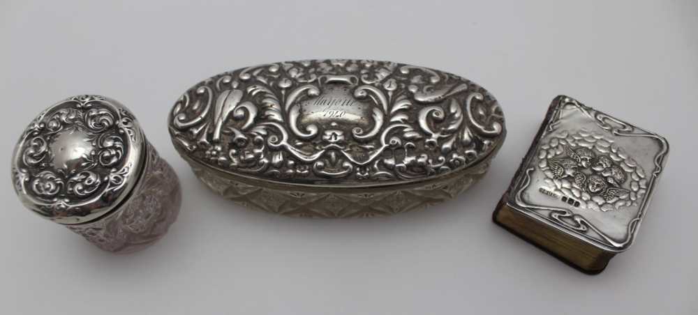 GIBSON & CO LTD, a miniature hymn book, the front mounted with an embossed silver panel, cherubs