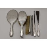 GOLDSMITHS & SILVERSMITHS CO. LTD, A SET OF SIX SILVER MOUNTED DRESSING TABLE VANITY ITEMS, to