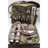 A 'CONCEPT' PICNIC SET, green canvas bag, with pouches, contains stainless steel flask, cutlery &
