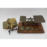 A GERMAN MADE POSTAL BALANCE SCALE, brass and painted iron, the circular top plate is printed with