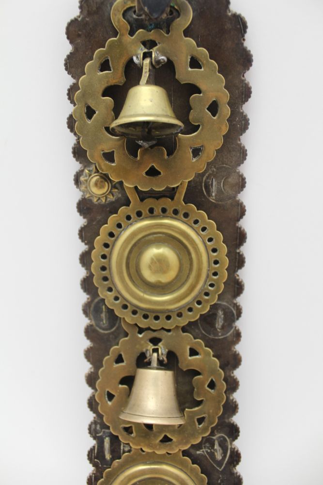 A VICTORIAN MARTINGALE STRAP with two brass bells and two brass bullseyes, 39cm x 10cm - Image 3 of 4