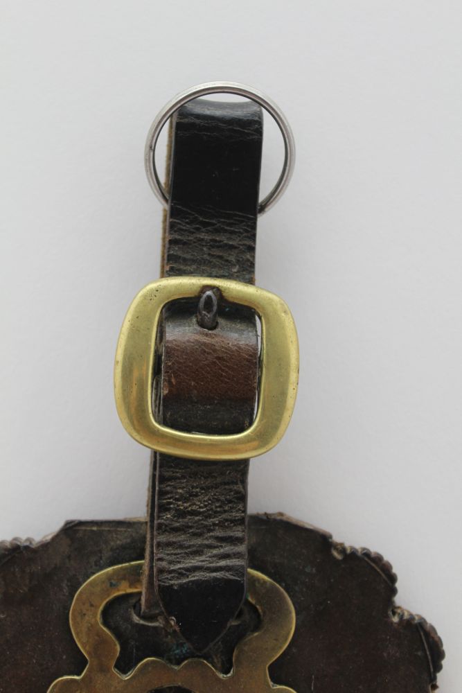 A VICTORIAN MARTINGALE STRAP with two brass bells and two brass bullseyes, 39cm x 10cm - Image 2 of 4