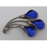 A TOSTRUP STERLING SILVER & BLUE ENAMEL NORWEGIAN BROOCH, in the form of three blooms, stamped 'J.