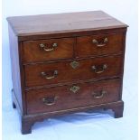 A 19TH CENTURY OAK CHEST OF TWO SHORT OVER TWO LONG DRAWERS, brass handles on bracket feet, 82cm