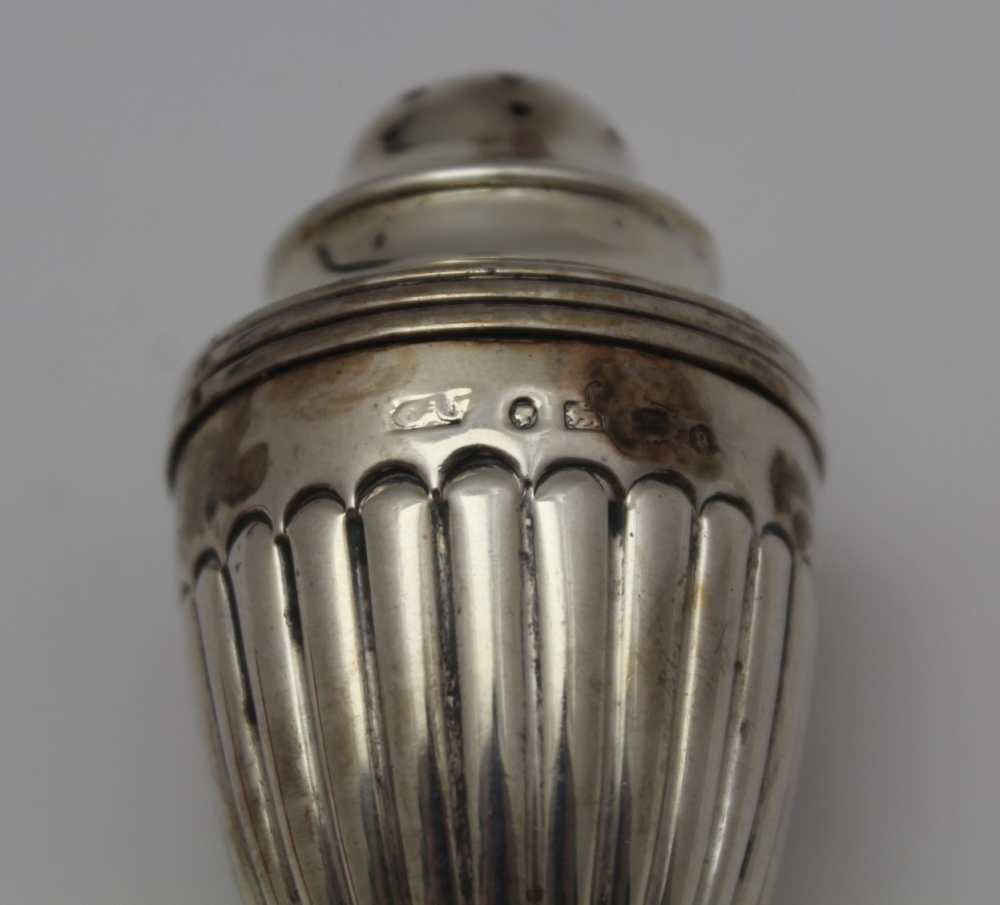 GEORGE UNITE A pair of Victorian silver peppers, of Regency Urn form, fluted bodies raised on square - Image 3 of 4