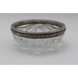 A RUSSIAN SILVER MOUNTED CUT GLASS BOWL, the band deeply embossed with bound laurel, various assay
