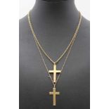 TWO 9CT GOLD CROSSES ON 9CT GOLD NECK CHAINS, one plain, one chased, combined weight; 6.9g
