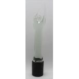 A 20TH CENTURY SEMI ABSTRACT FIGURATIVE GLASS SCULPTURE, ebonised base, indistinctly signed, 57cm