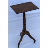 A 19TH CENTURY OCCASIONAL TABLE having associated rosewood rectangular top, on a turned mahogany