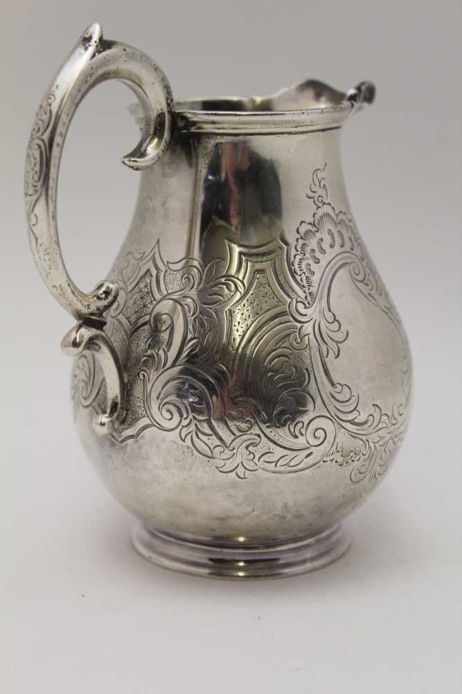 EDWARD, EDWARD JUNIOR, JOHN & WILLIAM BARNARD A silver milk jug, sea scroll handle, fluted spout - Image 2 of 3