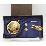 A 'ST ANDREWS' GOLF COURSE PRESENTATION GOLD PLATED SET, comprising a hip flask and a divot