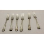CHARLES BOYTON A set of six silver table forks, engraved with a spread eagle crest, London 1884,