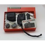 AN ASAHI PENTAX AUTO 110 CAMERA SYSTEM, set in original box, with booklet