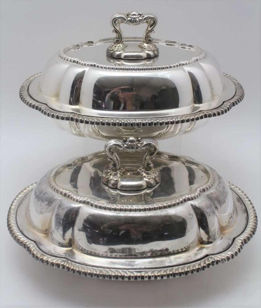 A PAIR OF SILVER PLATED CSHION FORM VEGETABLE TUREENS, serpentine gadrooned rims, the covers