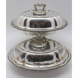 A PAIR OF SILVER PLATED CSHION FORM VEGETABLE TUREENS, serpentine gadrooned rims, the covers