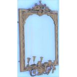 A 19TH CENTURY GILT GESSO FRAMED GIRONDELLE WALL MIRROR with urn crest & three sconces at the