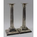 HARRISON BROTHERS & HOWSON (George Howson), A PAIR OF SILVER CANDLESTICKS, classical fluted column