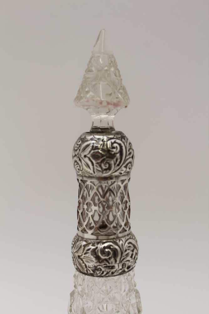 A PAIR OF EDWARDIAN SILVER CANDLESTICKS, embossed ribbon and bell husk swags on circular bases, - Image 7 of 9