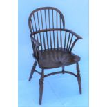 A THIRD QUARTER 20TH CENTURY REPRODUCTION DOUBLE COMB BACKED ARMCHAIR, with well figured solid seat,