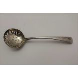 GABRIEL SLEATH An 19th century silver sifting spoon, feather edge cut handles, crested with two