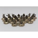 A COLLECTION OF TWENTY THAI STERLING SILVER MENU HOLDERS, varying cast designs, traditional
