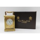 A CHARLES FRODSHAM CARIAGE CLOCK, ornate gilded brass case with columns at the case corners,dial